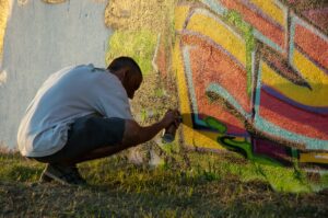 Giustizia Creativa: i Graffiti come mezzo di emancipazione sociale. 